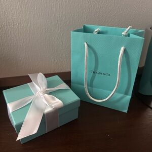 Tiffany & Co. jewelry box and bag
